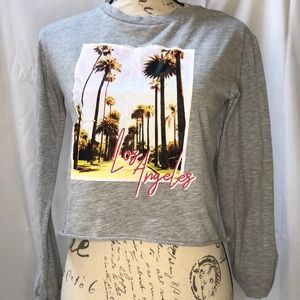 Women’s long sleeve cropped tee- size Small (NWOT)
